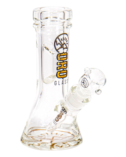 An Oro Glass Company 8.5 Karat Thick Beaker Water Pipe V2 with clear base logo.